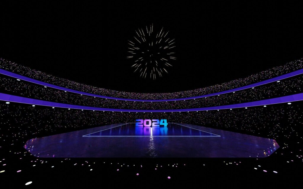 fireworks are lit up in the night sky above a basketball court